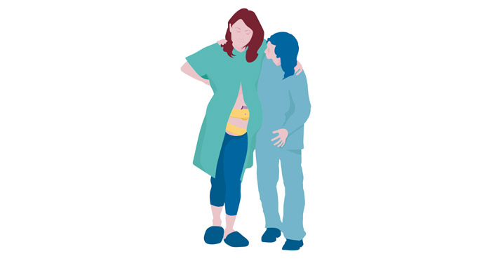 a woman standing next to a woman